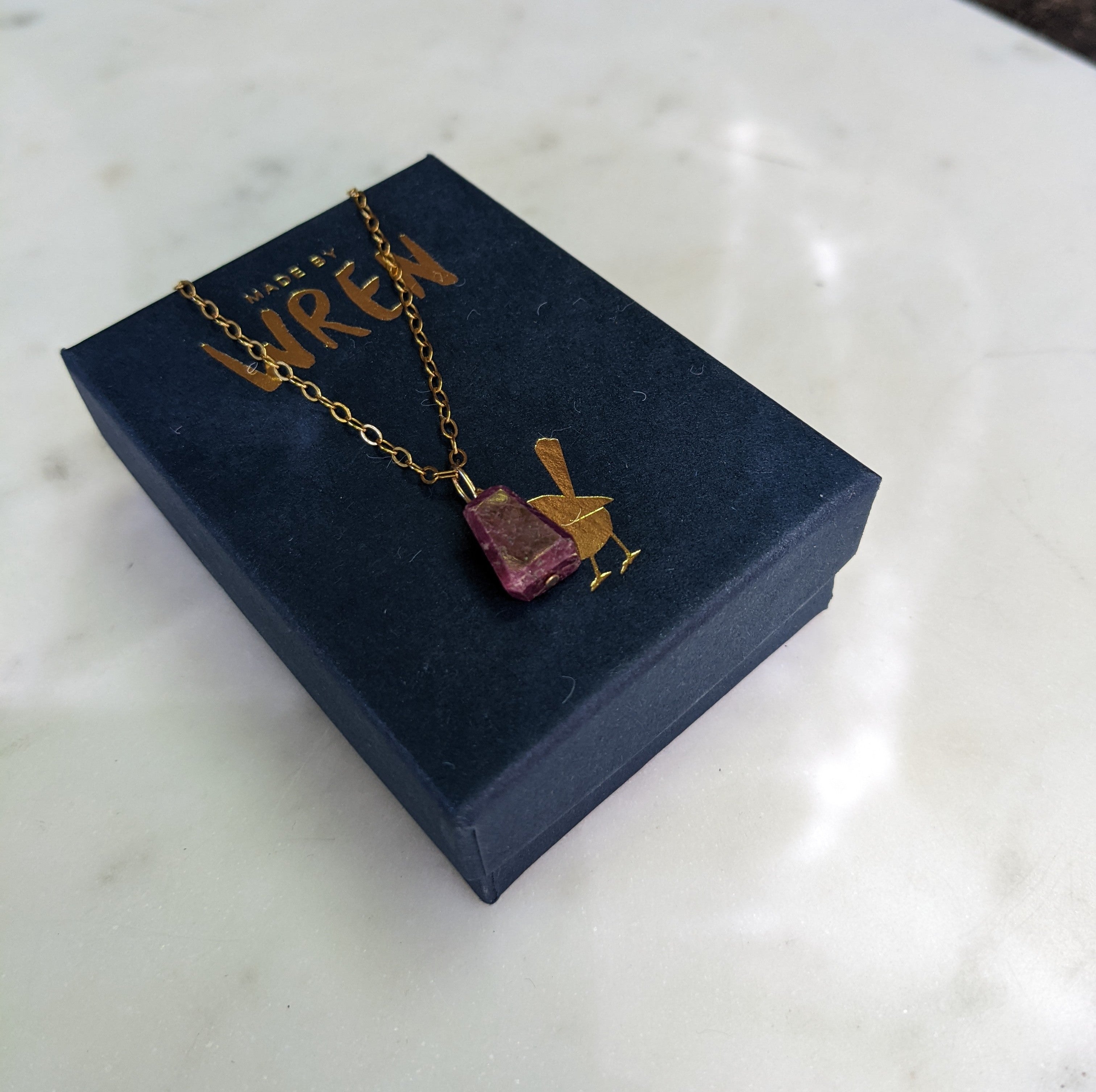 Ruby wire wrapped gold necklace